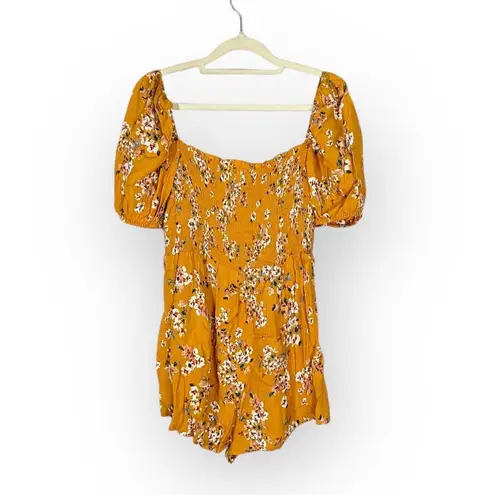 Flynn Skye Justine Romper Women's Medium Orange Floral Puff Sleeve Smocked RTR