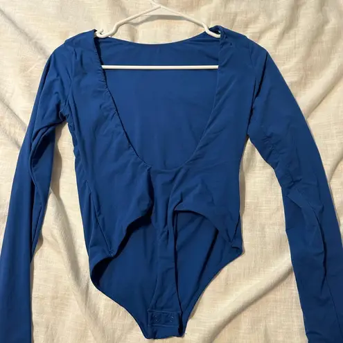 SKIMS NWOT  Fits everybody backless long sleeve bodysuit