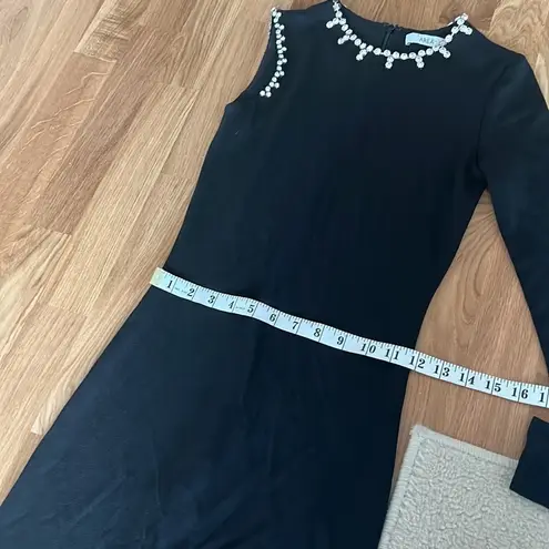 Area black asymmetrical jumpsuit with crystal embellishment