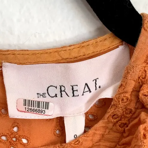 The Great Eyelet Ruffle Flutter Top in Spice Orange