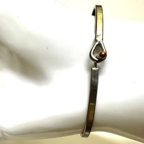 Silver tone sisters bangle bracelet