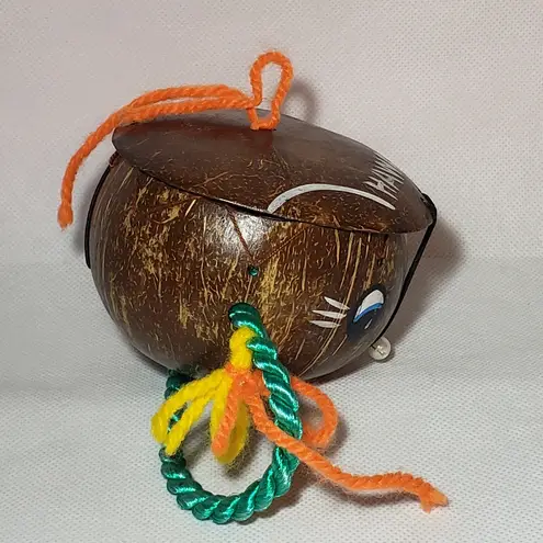 Coconut souvenir purse with painted face pearly bead nose & yarn handle Green