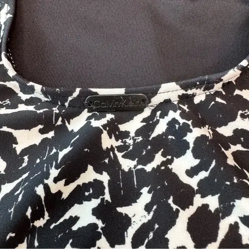 Calvin Klein  Women's Black and White One-Piece Swimsuit - Size Medium