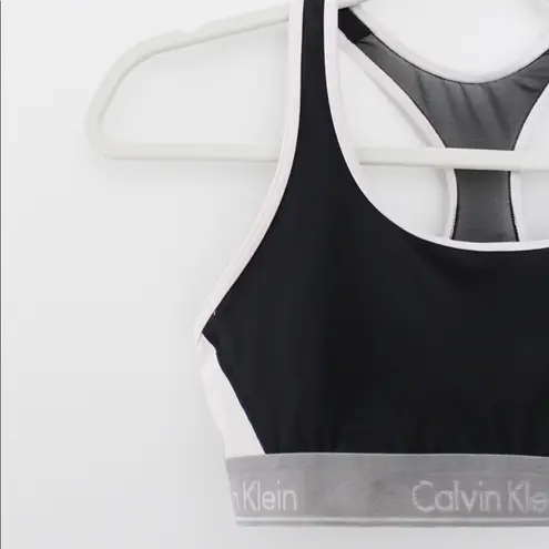 Calvin Klein / Revolve New Flex Motion Medium Impact Sports Bra in Black Color Block