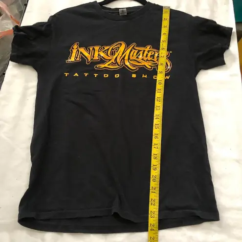 Ink Masters Tattoo Show black gold yellow print graphic streetwear t