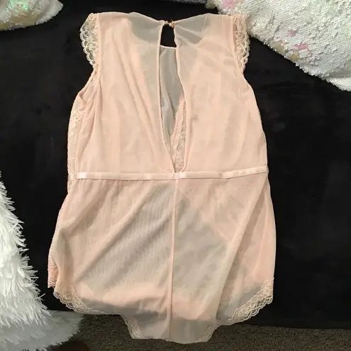 Boutique New in package! Peach color 60s style lace see through body suit! SOFT