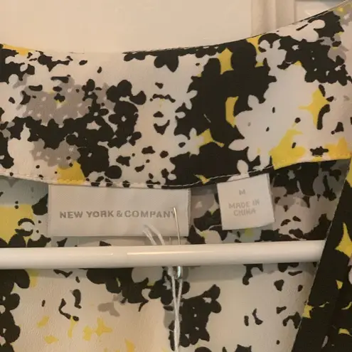 New York & Company Yellow and Black Abstract Floral Blouse. Size