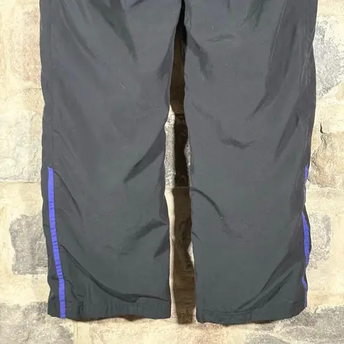 Reebok  Trak‎ Pants Woman's Large Black Purple Lined Athletic Workout Running