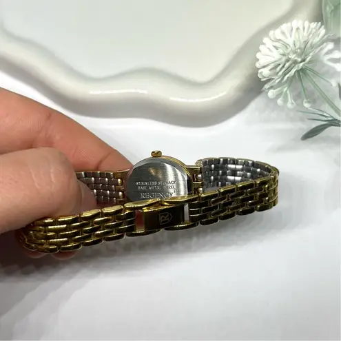 Vintage women’s gold dainty watch