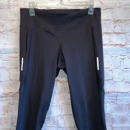 Adidas  how we do 7/8 tight leggings black reflective tabs mesh details medium