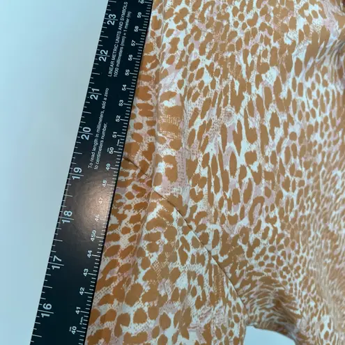 Laila Ali tan & pink animal print long sleeve shirt with tie up front and hood. Size XS
