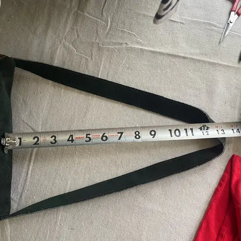 Stylish Green Suede Shoulder Bag with Purple and Gold Accents