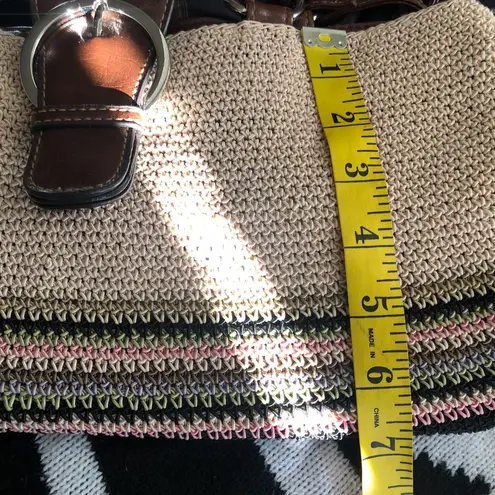 Cute 90s beige cream tan khaki crochet bag with a brown green pink stripes shoulder hand bag purse and buckle detail.