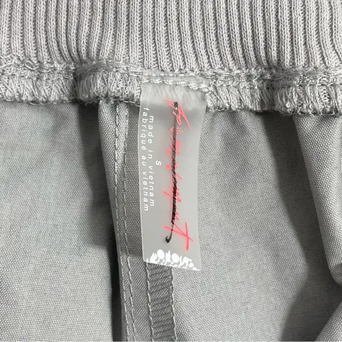 NEW Free People FP Movement Mesmerize Me Shine Pants Size SMALL Silver