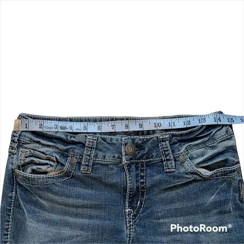 Silver Jeans Suki Mid Boot Fluid Jean with Faux Flap Pockets.