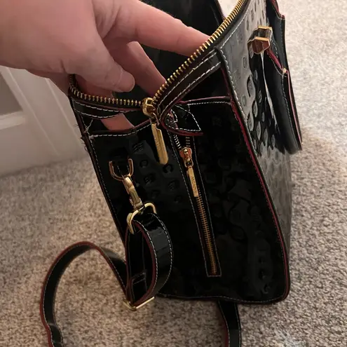 Like New Arcadia Black Leather Handbag with Red Accents.