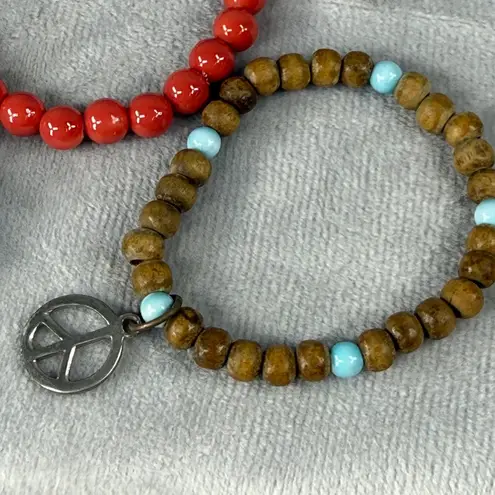 Set Of 3 Beaded Stretch Bracelets Red Blue & Natural Wood Beads Peace Sign Charm