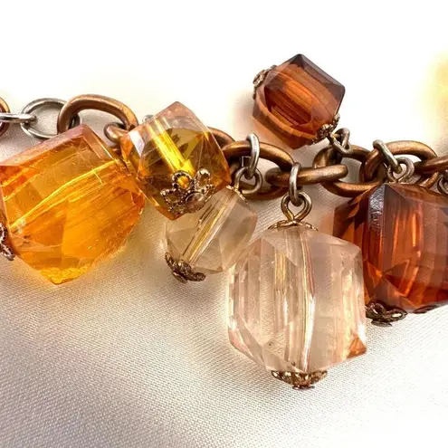 Joan Rivers  amber tone beaded charm bracelet