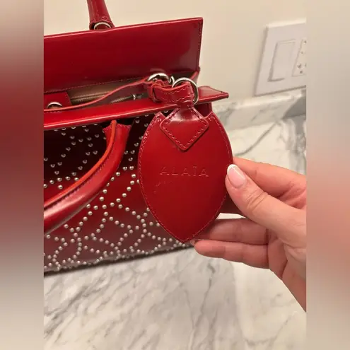 Alaïa Red Leather Studded Top Handle Bag – AUTHENTIC