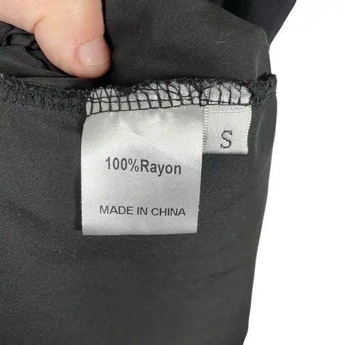 Swiss Dot Tiered Ruffle Babydoll Tie Strap Mini Dress in Black Size S