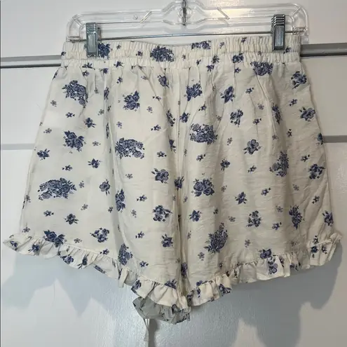 Threads of Luxx Blue Floral Women's Shorts with ruffled edge size medium. White