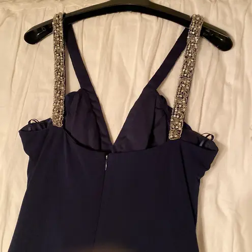 The brand is JS Boutique, it’s a size 10, and it’s color is navy blue.