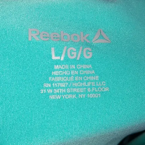 Reebok 🔹4 for $30  Women's 2-in-1 Athletic Shorts, Large