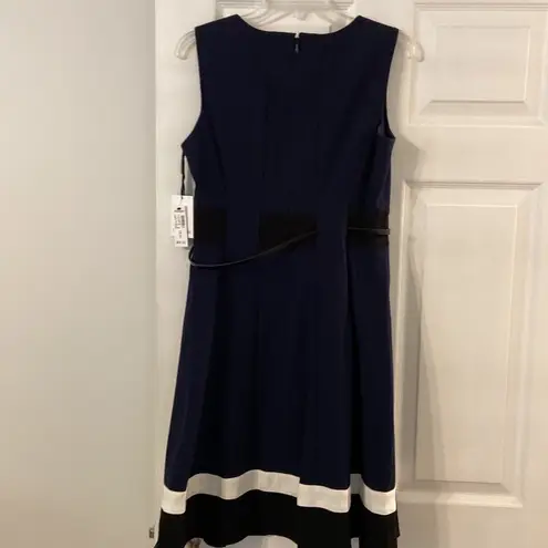 Calvin Klein  Dress brand new with tag size 6 with belt around waist
