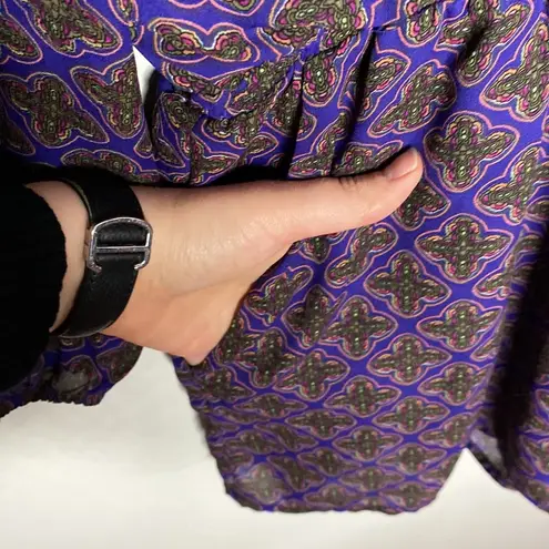 Lucca Couture open back purple long sleeve romper with medallion print size L