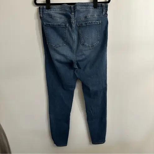 Torrid  Sky High Skinny Women’s size 14R comfy stretch blue denim distressed