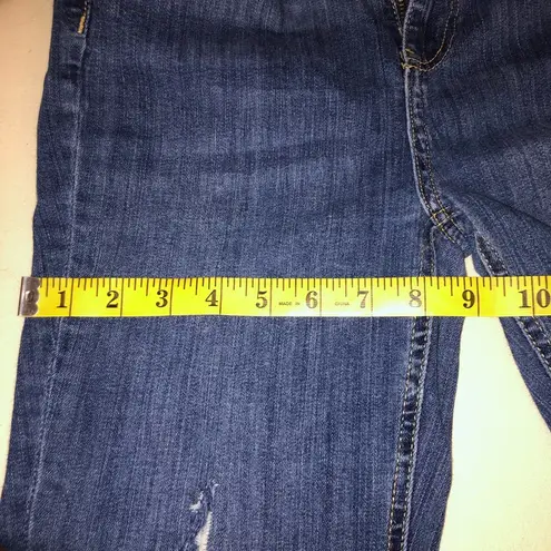 Free People  high waisted skinny jeans with holes at knees size 29