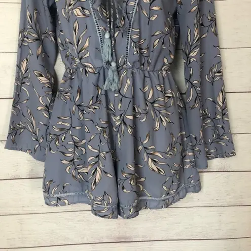 The Hanger Boutique Blue Floral V-Neck Bell Sleeve Romper S