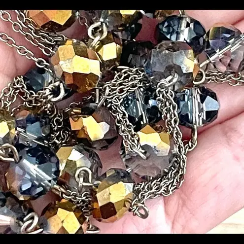 Long silver tone crystal necklace