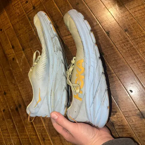 Hoka One One light green athletic running 10 sneakers