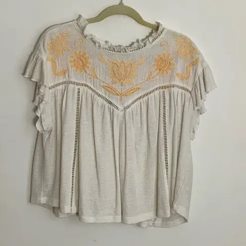 Free People  white flowy top with beaded detail