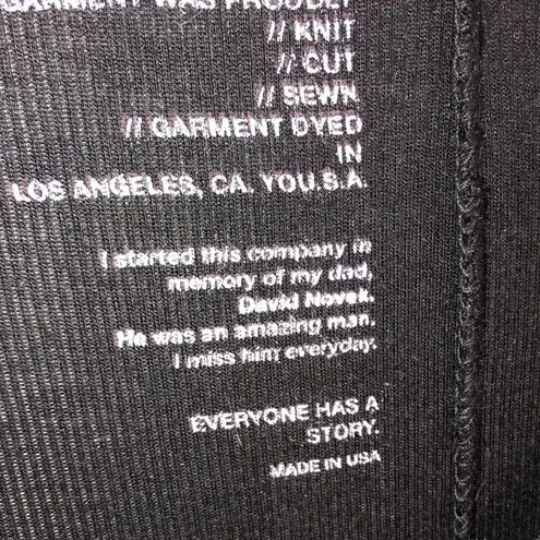 Good hYOUman . size small black shark bite top