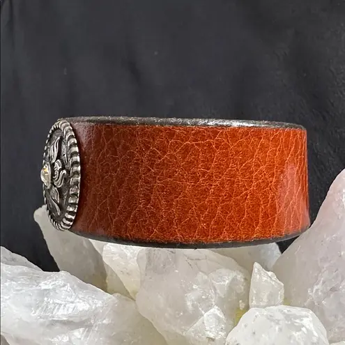 Leather EUC snap bracelet with silvertone medallion and CZ center stone Brown