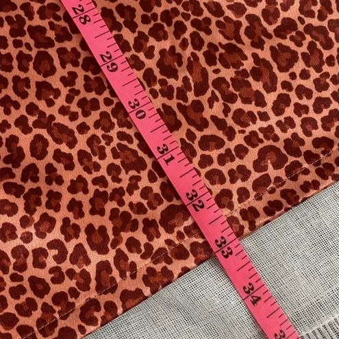 Sweet Storm cheetah print mini dress with cutouts.