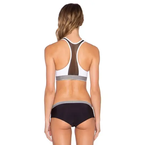 Calvin Klein / Revolve New Flex Motion Medium Impact Sports Bra in Black Color Block