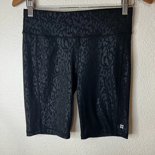 Sweaty Betty  All Day 9” inseam black leopard cheetah animal print biker shorts S