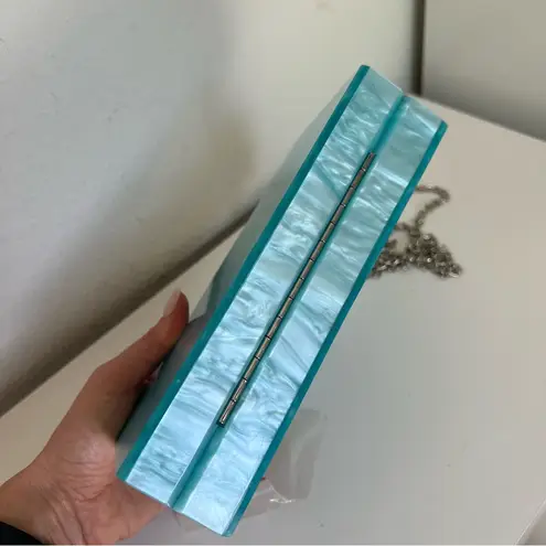 Anthropologie x Rae Of Light Acrylic Bow Clutch Box Bag in Blue and White