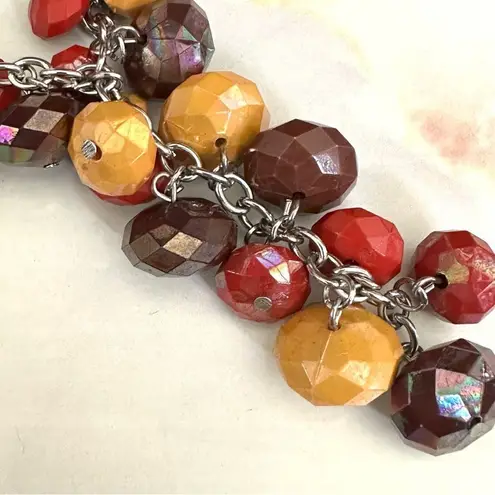 Multi beaded silver tone statement necklace