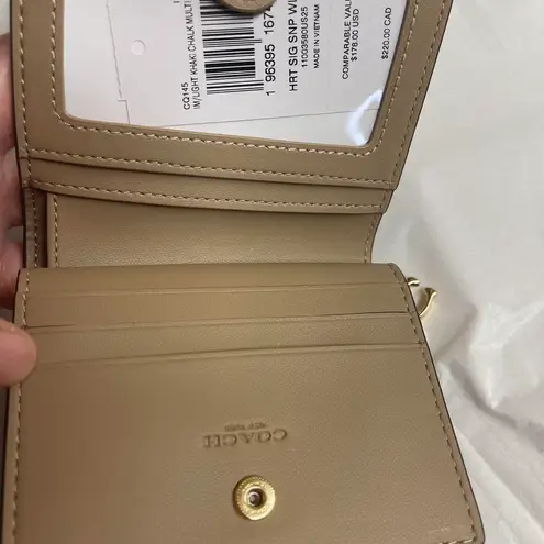 Coach Snap Wallet In Signature Canvas With Heart Print