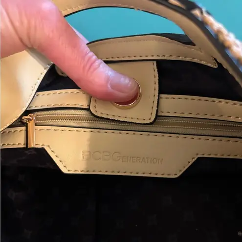 BCBGeneration Brand new Tan Woven Clutch Bag with yellow handle.