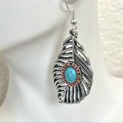 Silver tone feather and faux turquoise earrings