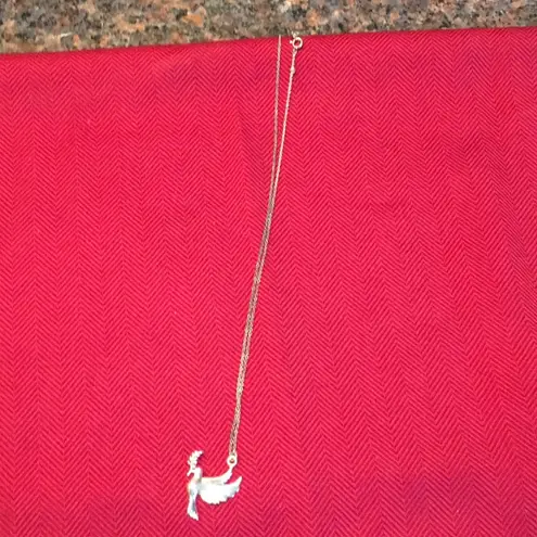 Bird gold colored charm