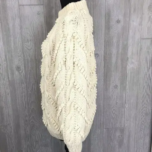 Handmade crochet cotton knitted sweater with pom poms and braids oversized