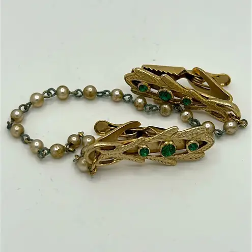 Vintage gold tone sweater clip