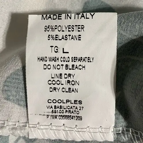 Coolples Made in Italy maxi dress featuring a smocked bodice, short sleeves. Size L