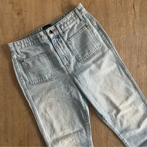 KHAITE Rachel Patch Pocket Flare Jeans - Light Blue
Denim Austin - Size 28